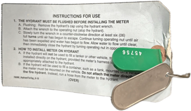 Fire hydrant meter tag with instructions for using the hydrant issued by WSSC with the rental