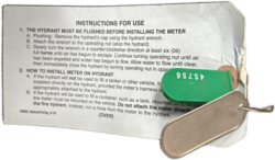 Fire hydrant meter tag with instructions for using the hydrant issued by WSSC with the rental